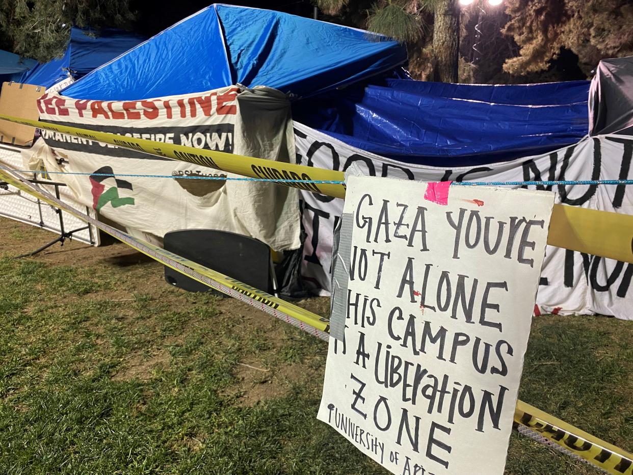 Protesters at the University of Arizona build an encampment on campus to demand divestment from Israel on April 30, 2024.