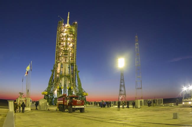 Soyuz-FG rocket is seen prior to the launch at the Russian leased Baikonur cosmodrome, Kazakhstan, Thursday, Nov. 7, 2013. The crew of the space craft will deliver Olympic torch to space as part of the ongoing Olympic torch relay. The torch will be brought back along with the station's current crew. (AP Photo/Shamil Zhumatov, Pool)