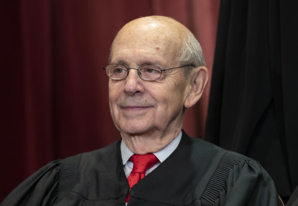 FILE - Supreme Court Associate Justice Stephen Breyer, appointed by President Bill Clinton, sits with fellow Supreme Court justices for a group portrait at the Supreme Court Building in Washington, Nov. 30, 2018. Breyer said in a letter to President Joe Biden that his retirement will take effect on Thursday, June 30, 2022, at noon, after nearly 28 years on the nation’s highest court. (AP Photo/J. Scott Applewhite, File)