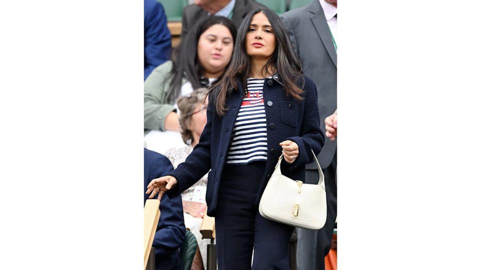 Salma Hayek in a navy co-ord and Gucci T-shirt at Wimbledon