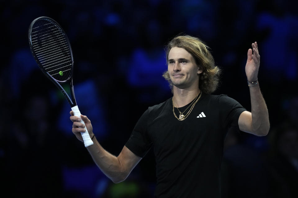 Germany's Alexander Zverev celebrates after winning the singles tennis match against Spain's Carlos Alcaraz, of the ATP World Tour Finals at the Pala Alpitour, in Turin, Italy, Monday, Nov. 13, 2023. (AP Photo/Antonio Calanni)