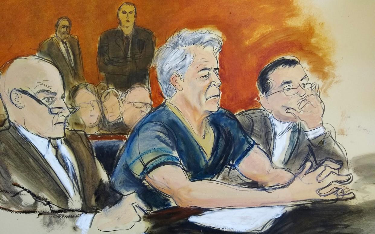 Artist's sketch of Epstein with his lawyers Martin Weinbergand Marc Fernich in court on Monday - FRE142054 AP