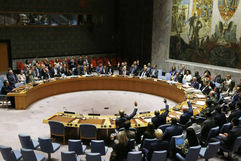 FILE - The United Nations Security Council votes to pass a new sanctions resolution against North Korea during a meeting at U.N. headquarters on Sept. 11, 2017. (AP Photo/Jason DeCrow, File)