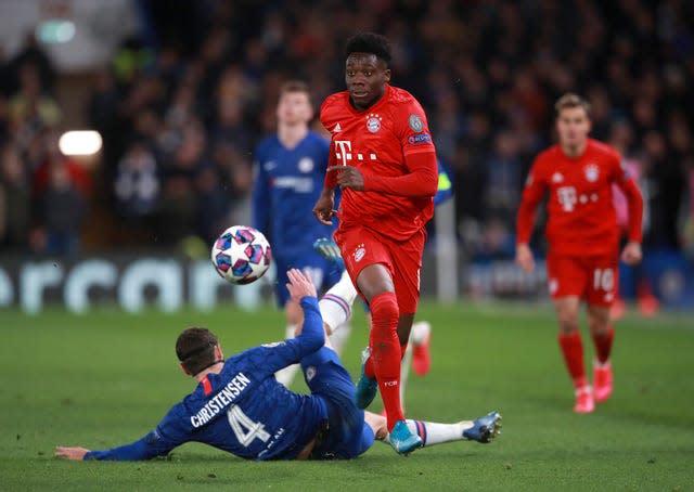 Bayern Munich’s Alphonso Davies, right, was born in a refugee camp