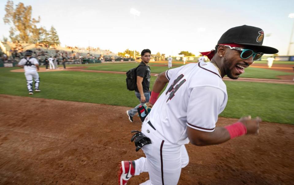 Modesto Nuts outfielder Lazaro Montes takes the field to start the game during season home opener with Lake Elsinore at John Thurman Field in Modesto, Calif., Tuesday, April 9, 2024.