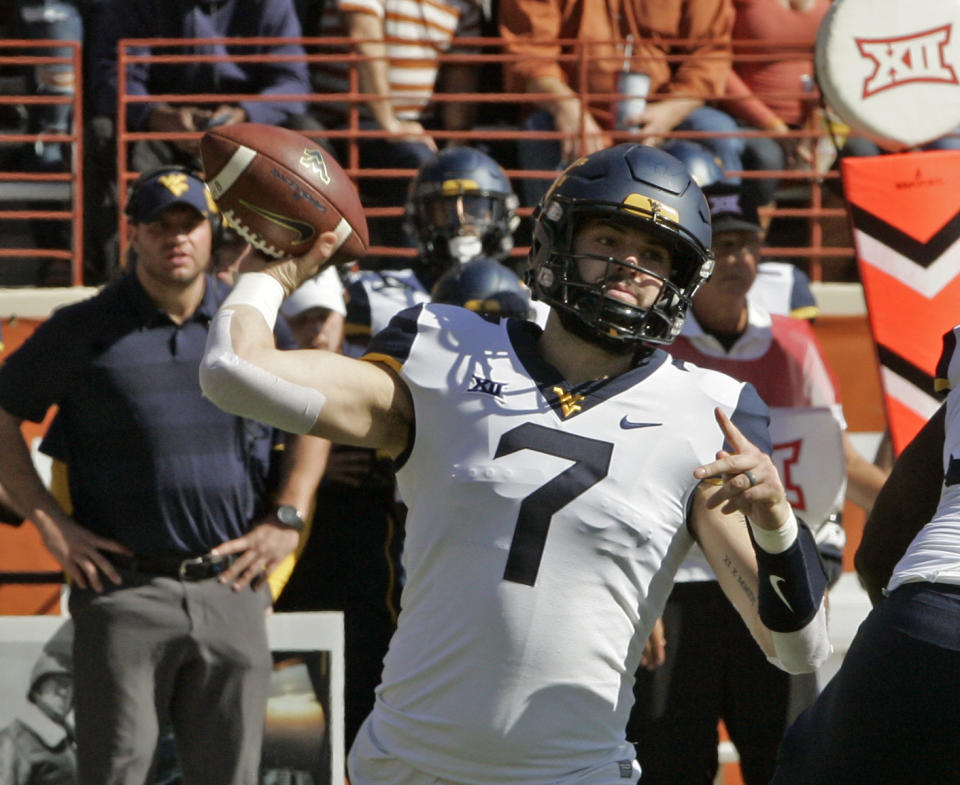 Will Grier plans on throwing at the NFL scouting combine, a necessity for him as there are questions about his arm strength at the pro level. (AP)