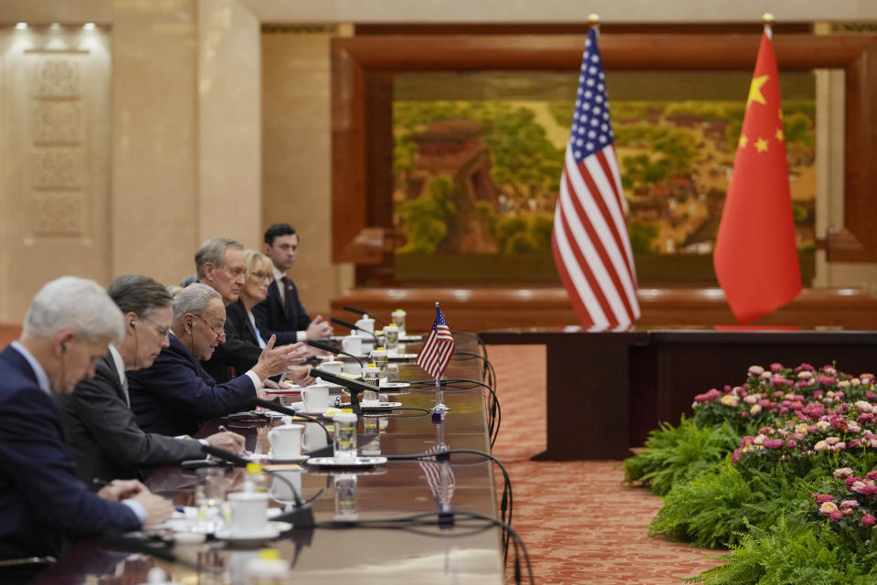 Visiting U.S. Senate Majority Leader Chuck Schumer, D-N.Y., third from left, speaks during a bilateral meeting with Zhao Leji, chairman of China's National People's Congress, at the Great Hall of the People in Beijing, Monday, Oct. 9, 2023. (AP Photo/Andy Wong, Pool)