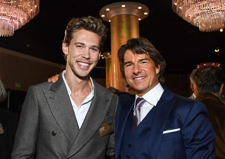 Austin Butler ("Elvis"), left, and Tom Cruise ("Top Gun: Maverick") mingle at the Oscar nominees luncheon.