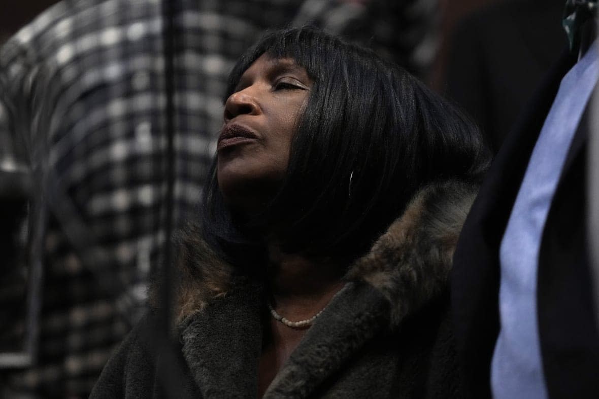 RowVaughn Wells, mother of Tyre Nichols, pauses as she listens during a news conference about the death of her son Tuesday, Jan. 31, 2023, at Mason Temple in Memphis, Tenn. (AP Photo/Jeff Roberson)