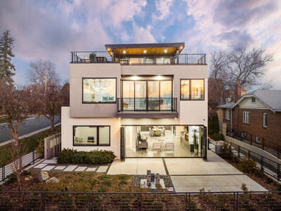 With a welcoming, contemporary facade, this home invites endless outdoor connectivity through multiple access points, placing residents in the heart of Sloan's Lake.