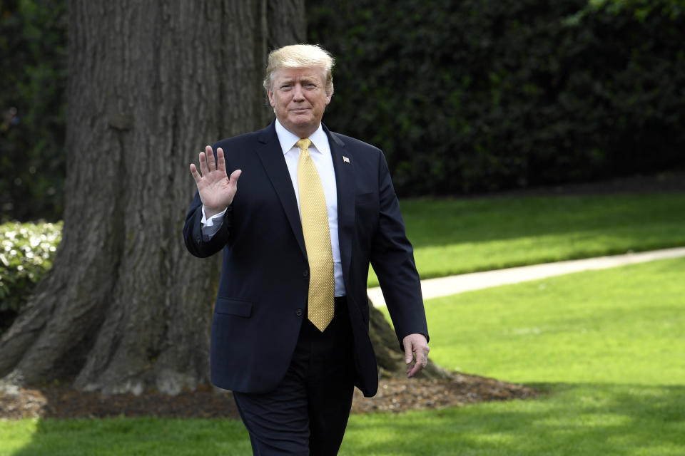 President Donald Trump waves as he arrives to speak on the South Lawn of the White House in Washington, Thursday, April 25, 2019, as part of the activities for Take Our Daughters and Sons to Work Day at the White House. (AP Photo/Susan Walsh)