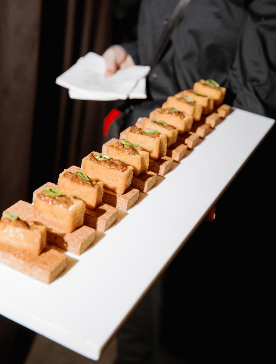 crispy rice cakes shown at Chinese-Jewish wedding. (Kait Pena)