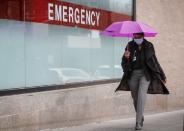 A Healthcare worker arrives at Mount Sinai Hospital, during the outbreak coronavirus disease (COVID-19) outbreak, in New York