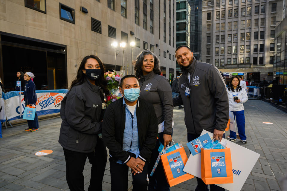 Brian Morales celebrates his lifesavers on the TODAY plaza. (Nathan Congleton / TODAY)