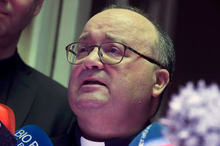 Vatican special envoy Archbishop Charles Scicluna speaks with the media after meeting with victims of sexual abuse allegedly committed by members of the church, in Santiago, Chile February 20, 2018. REUTERS/Claudio Santana