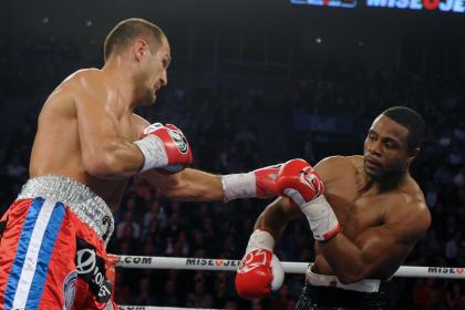 Sergey Kovalev (left) lands against Jean Pascal in March. (Getty)