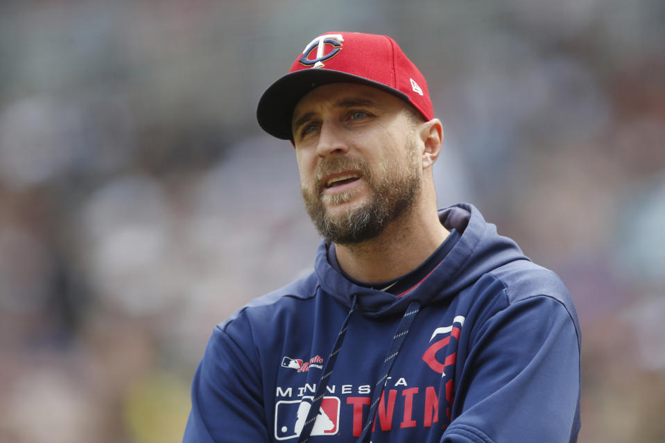 FILE - In this May 11, 2019, file photo, Minnesota Twins manager Rocco Baldelli looks up during the team's baseball game against the Detroit Tigers in Minneapolis. Baldelli has narrowly beaten out Aaron Boone of the New York Yankees to win AL Manager of the Year. (AP Photo/Jim Mone, File)