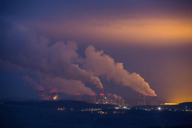  A view of Turow Power Plant, a thermal condensing power plant with closed cooling water system in Bogatynia. The basic fuel of the power plant is lignite. On the right, light pollution from the huge greenhouse.
Poland generates most of its electricity from coal and lignite or brown coal and is the only EU member not to have pledged to achieve carbon neutrality by 2050. (Photo by Karol Serewis / SOPA Images/Sipa USA) 