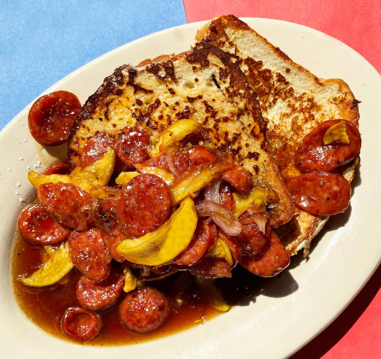 An order of Cafe Berlin's Apples and Sausage served on French toast