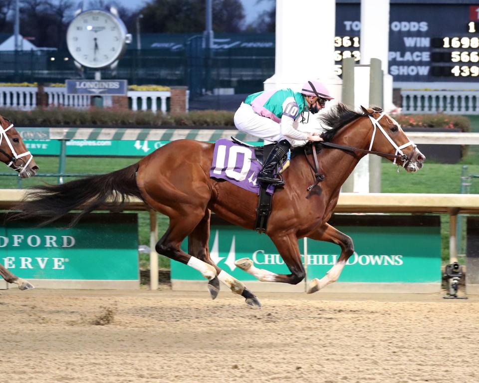 Mandaloun and jockey Florent Geroux win an optional claiming race at Churchill Downs on Nov. 28, 2020. (Photo courtesy of Coady Photography.)