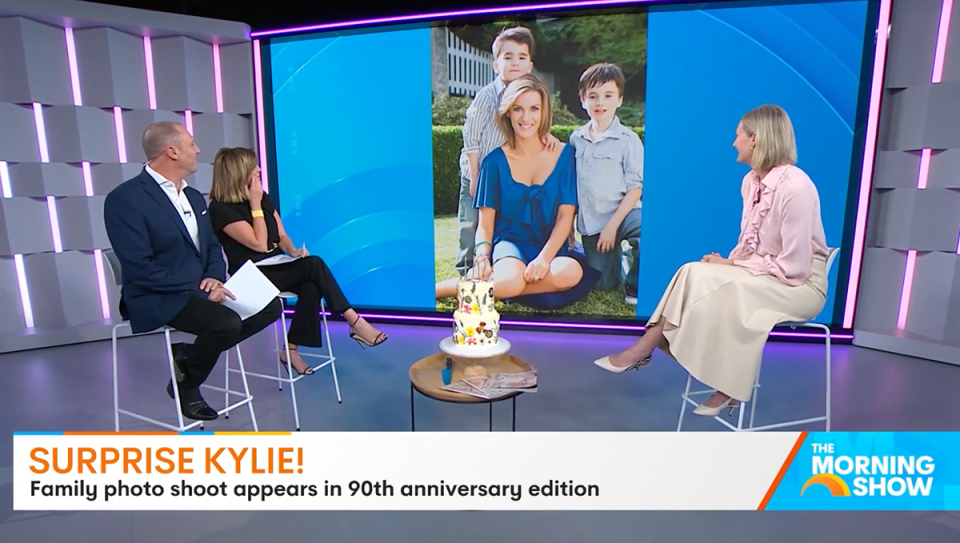 The Morning Show’s Larry Emdur and Kylie Gillies looking at Kylie's family photos from 2009.