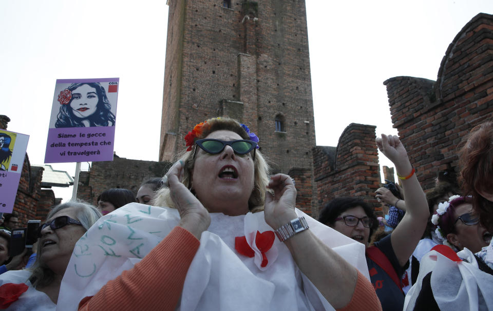 People march to protest the World Congress of Families, in Verona, Italy, Saturday, March 30, 2019. A congress in Italy under the auspices of a U.S. organization that defines family as strictly centering around a mother and father has made Verona — the city of Romeo and Juliet — the backdrop for a culture clash over family values, with a coalition of civic groups mobilizing against what they see as a counter-reform movement to limit LGBT and women's rights. (AP Photo/Antonio Calanni)