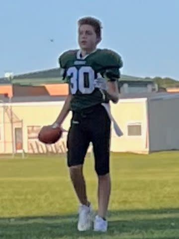 <p>Claudia Stinson</p> Anthony Stinson in his football jersey.