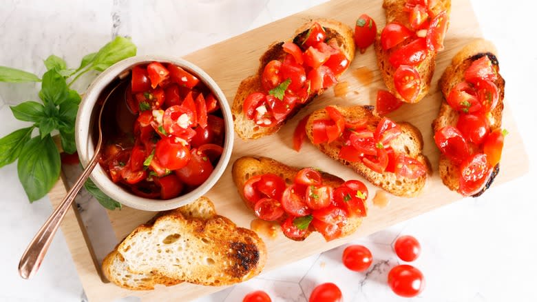 Bruschetta crostini on wooden board