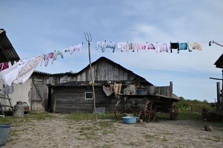 The Wider Image: Russian village's last teacher stays on for her one remaining pupil