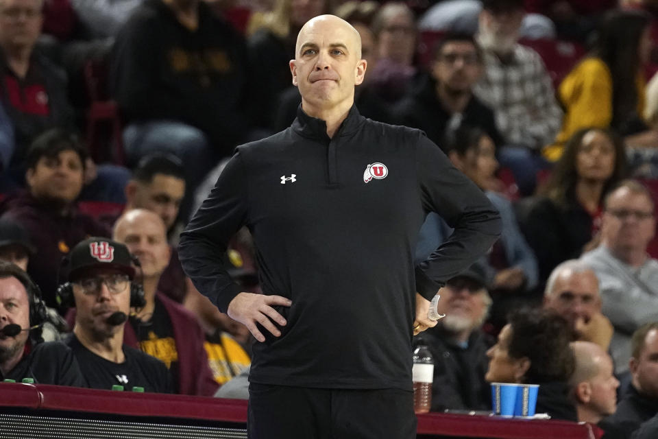 Utah coach Craig Smith stands near the sideline during the second half of the team's NCAA college basketball game against Arizona State on Thursday, Jan. 4, 2024, in Tempe, Ariz. (AP Photo/Darryl Webb)