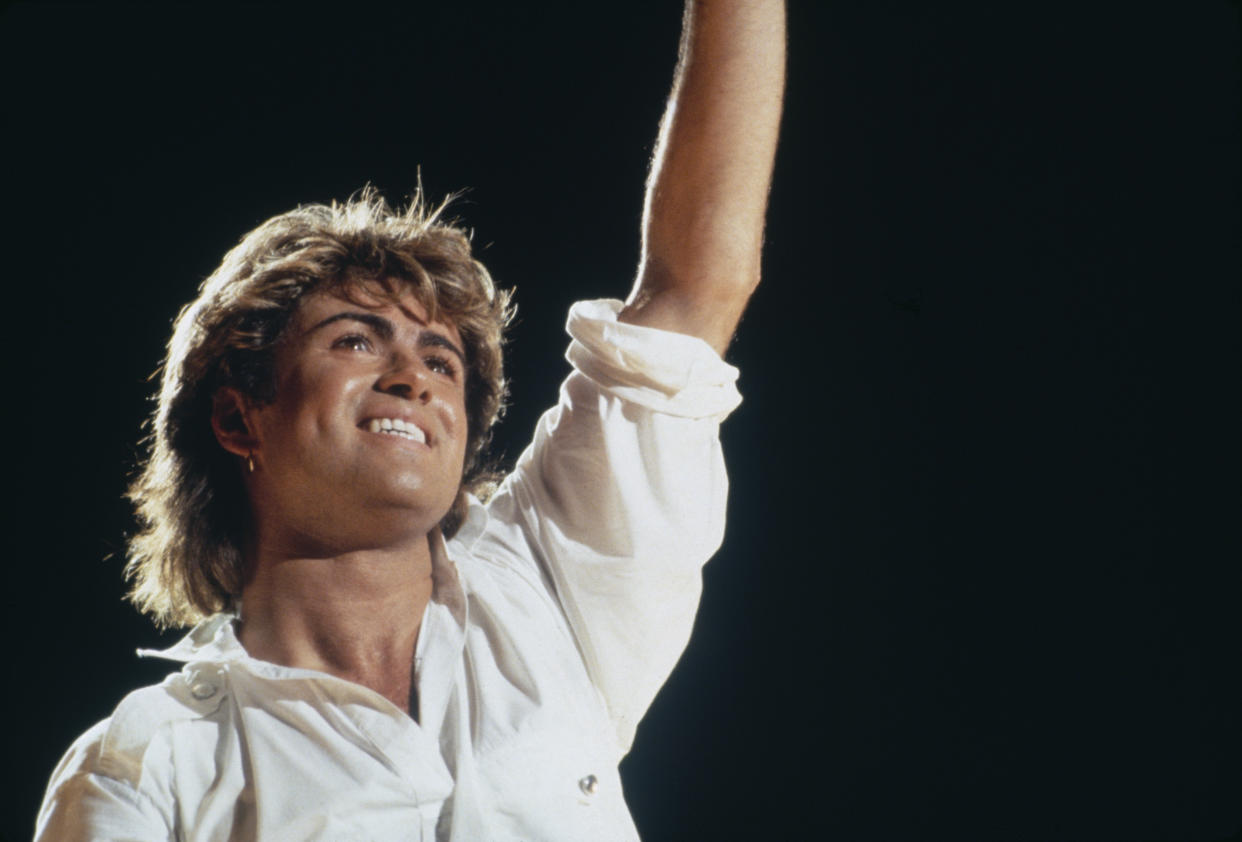 Singer-songwriter George Michael (1963-2016) of Wham!, performing on stage during the pop duo's 1985 world tour, January 1985.'The Big Tour' took in the UK, Japan, Australia, China and the US. (Photo by Michael Putland/Getty Images)