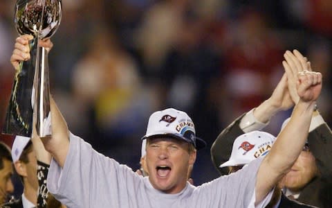 Tampa Bay Buccaneers head coach Jon Gruden celebrates holding up the Vince Lombardi Trophy after winning Super Bowl XXXVII at Qualcomm Stadium in San Diego, January 26, 2003 - Credit:  Reuters