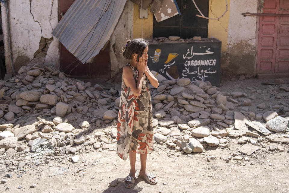 An aftershock rattled Moroccans on Sunday as they prayed for victims of the nation’s strongest earthquake in more than a century and toiled to rescue survivors while soldiers and workers brought water and supplies to desperate mountain villages in ruins.  (Mosa'ab Elshamy / AP)