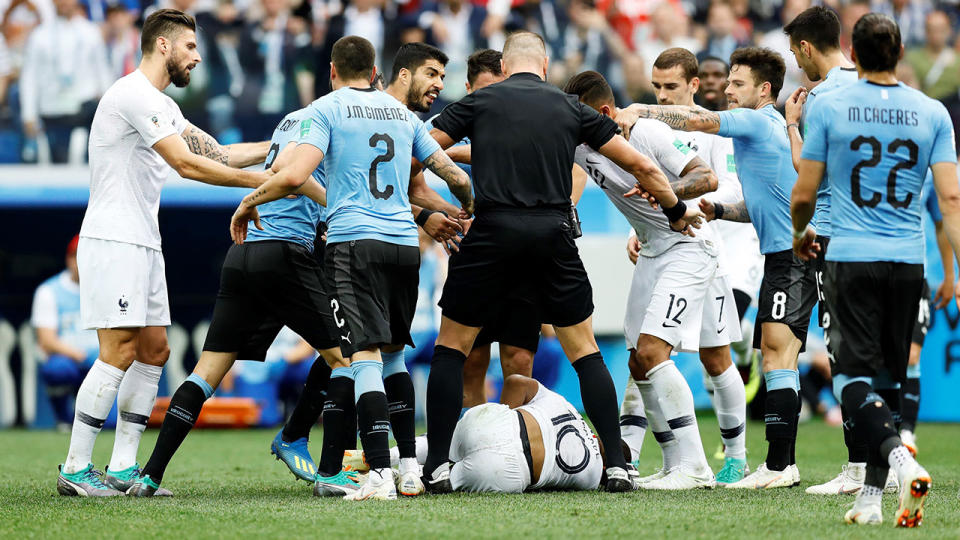 <strong>Uruguay players fire up over the dive. Pic: Getty</strong>