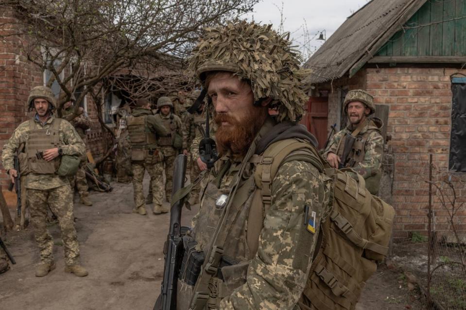 Ukrainian infantry soldiers of the 23rd Mechanized Brigade wait to head toward the frontline in the Avdiivka direction, in the Donetsk region, on April 3, 2024, amid the Russian invasion of Ukraine. (Roman Pilipey / AFP via Getty Images)