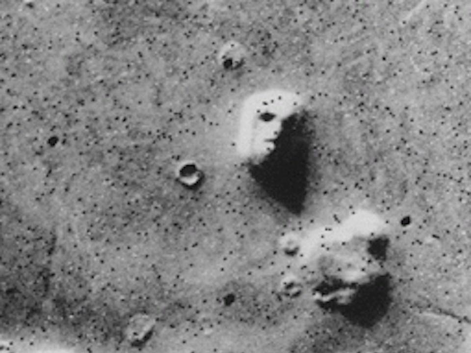 NASA's viking 1 picture shows a face-like rock formation on the surface of Mars