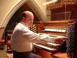 Robert Sullivan, director of music and liturgy at St. Peter Catholic Church and the Basilica of St. John in Canton.