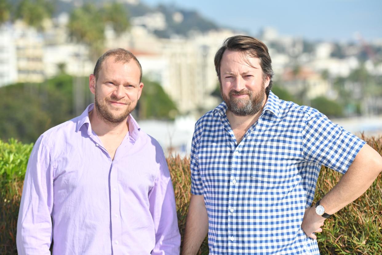 (LtR) actors David Mitchell and Robert Webb pose during the MIPCOM trade show (standing for International Market of Communications Programmes) in Cannes, southern France, on October 17, 2017.  / AFP PHOTO / YANN COATSALIOU        (Photo credit should read YANN COATSALIOU/AFP via Getty Images)