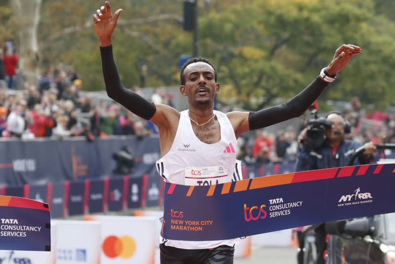 Tamirat Tola of Ethiopia crosses the finish line at the 2023 New York Marathon Sunday. Photo by John Angelillo/UPI