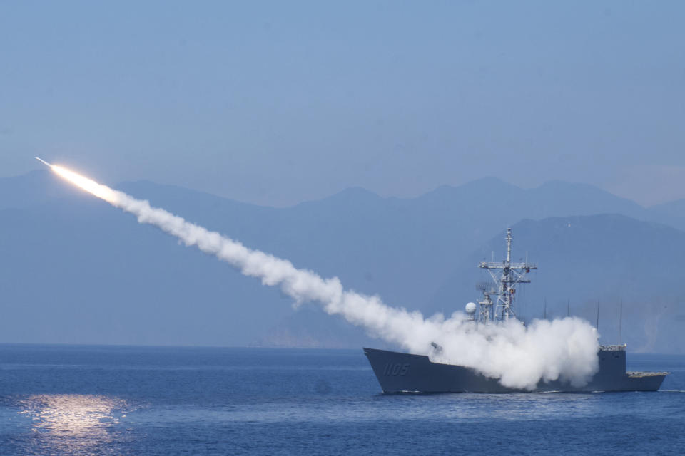 A Cheng Kung class frigate fires an anti air missile as part of a navy demonstration in Taiwan's annual Han Kuang exercises off the island's eastern coast near the city of Yilan, Taiwan on Tuesday, July 26, 2022. The Taiwanese capital Taipei staged a civil defense drill Monday and President Tsai Ing-wen on Tuesday attended the annual Han Kuang military exercises, although there was no direct connection with tensions over a possible visit by U.S. House Speaker Nancy Pelosi.(AP Photo/Huizhong Wu)