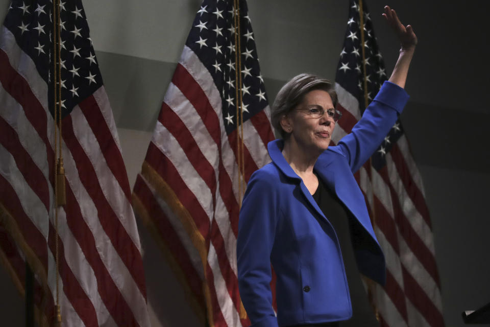 Democratic presidential candidate Sen. Elizabeth Warren, D-Mass., waves after her address at the New Hampshire Institute of Politics in Manchester, N.H., Thursday, Dec. 12, 2019.(AP Photo/Charles Krupa)