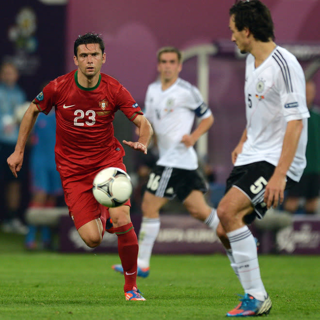 German defender Mats Hummels (R) vies with Portuguese forward Helder Postiga during the Euro 2012 championships football match Germany vs Portugal on June 9, 2012 at the Arena Lviv. AFP PHOTO / JEFF PACHOUDJEFF PACHOUD/AFP/GettyImages