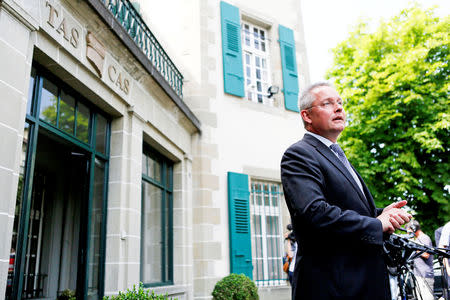 FILE PHOTO: Court of Arbitration for Sports (CAS) Secretary General Matthieu Reeb speaks to journalists about the final decision in the case between the Russian Olympic Committee (ROC), 68 Russian athletes and the International Association of Athletics Federations (IAAF) over their participation in the Rio Olympic Games, in Lausanne, Switzerland, July 21, 2016. REUTERS/Pierre Albouy Picture Supplied by Action Images/File Photo