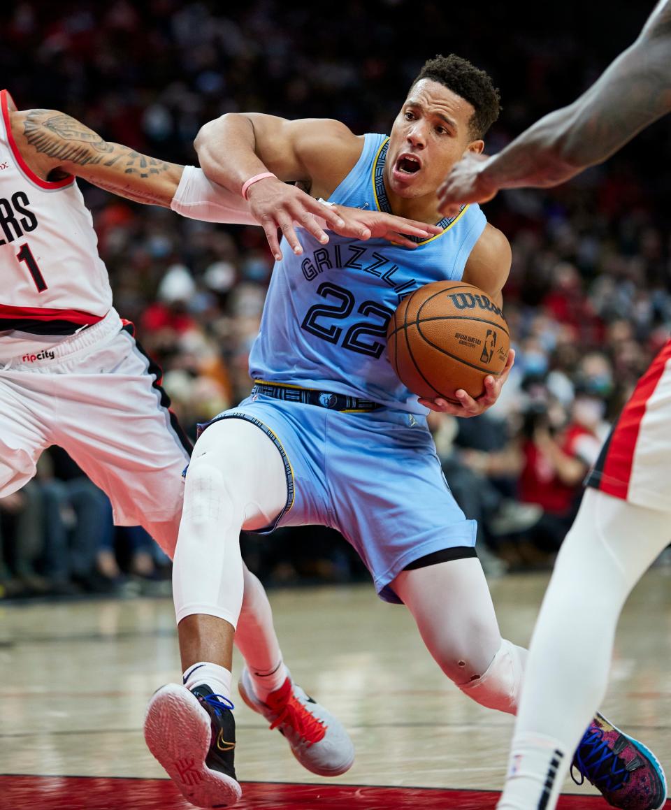 Memphis Grizzlies guard Desmond Bane drives to the basket against the Portland Trail Blazers during the second half of an NBA basketball game in Portland, Ore., Wednesday, Dec. 15, 2021. (AP Photo/Craig Mitchelldyer)