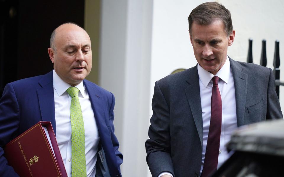 Andrew Griffith MP and Chancellor of the Exchequer Jeremy Hunt depart Downing Street in September 2023