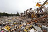 <p>A view of damaged buildings at the site of an explosion in Ningbo, China’s eastern Zhejiang province on Nov. 26, 2017. (Photo: STR/AFP/Getty Images) </p>