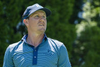 Kramer Hickok watches his shot off the ninth tee during the first round of the Travelers Championship golf tournament at TPC River Highlands, Thursday, June 24, 2021, in Cromwell, Conn. (AP Photo/John Minchillo)