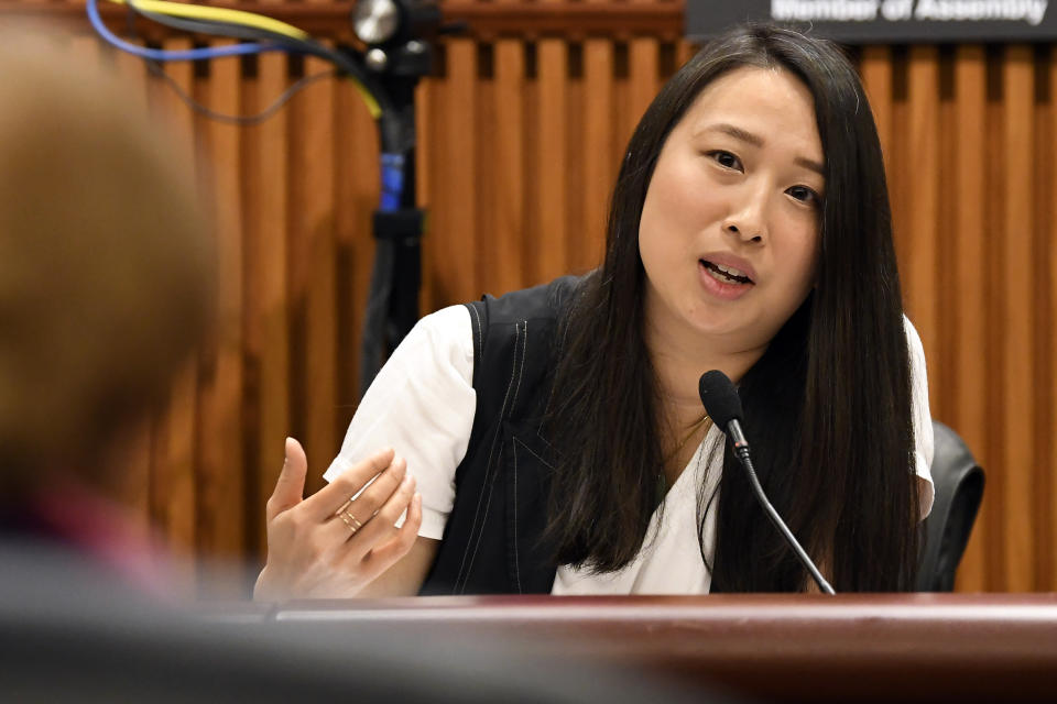 FILE— In this Feb. 13, 2019 file photo, New York Assemblywoman Yuh-Line Niou, D-New York, speaks during a public hearing on sexual harassment in the workplace, in Albany, N.Y. Gov. Andrew Cuomo’s response to accusations that he sexually harassed women on the job is being viewed as a tone-deaf “faux-pology” by critics and victim's advocates. Cuomo said in a statement that he only meant to joke with staff to add ‘levity’ to their serious work. However, at least two women have complained that they were uncomfortable with his alleged sexual advances and were forced to change jobs or leave state government. Yuh-Line Niou calls sexual harassment at the statehouse rampant. (AP Photo/Hans Pennink, File)
