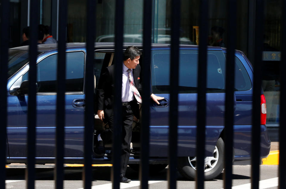 North Korean officials arrive in an embassy car at the VIP entrace at Beijing airport ahead of an Air China flight to Pyongyang, China, March 31, 2017. REUTERS/Thomas Peter TPX IMAGES OF THE DAY