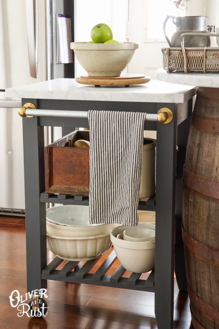 <p>Reorganising the cupboards after every baking session is inevitably a challenge. Give oversized dishes their own special spot - and gain more counter space - with a versatile rolling table. </p><p><em><a rel="nofollow noopener" href="http://www.oliverandrust.com/2014/02/ikea-hacking-in-kitchen-for-more.html" target="_blank" data-ylk="slk:See more at Olive and Rust »;elm:context_link;itc:0;sec:content-canvas" class="link ">See more at Olive and Rust »</a></em></p>